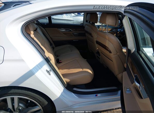 WBA7E4C57HGU99345 2017 BMW 7 SERIES White Widok naklejki z numerem VIN
