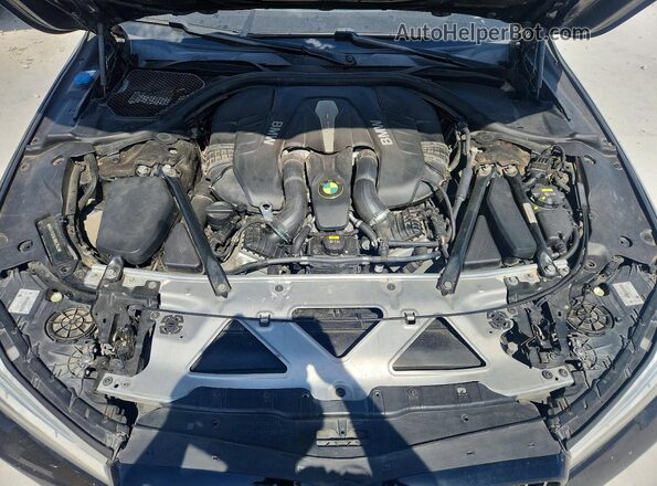 WBA7F0C56JGM23563 2018 BMW 7 SERIES Black Вид задньої частини салону