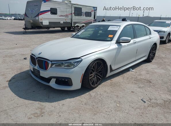WBA7F0C57JGM23328 2018 BMW 7 SERIES Белый Передняя левая четверть