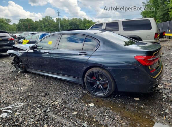 WBA7F0C59JGM22648 2018 BMW 7 SERIES Blue Trasero izquierdo