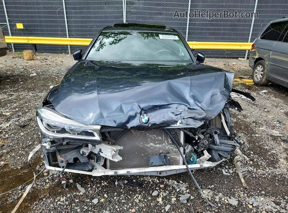 WBA7F0C59JGM22648 2018 BMW 7 SERIES Blue Vista frontal
