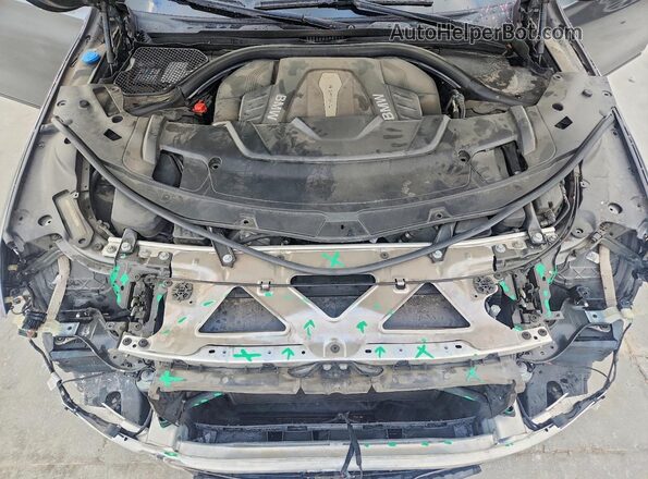 WBA7F0C59JGM23072 2018 BMW 7 SERIES Gray Սալոնի հետևի տեսք