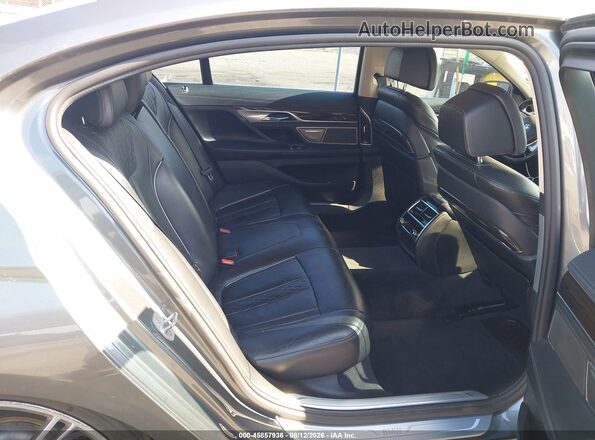 WBA7F0C5XGGL99700 2016 BMW 7 SERIES Gray Вид наклейки з VIN-кодом