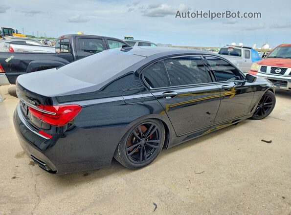 WBA7F0C5XHGM21065 2017 BMW OTHER Черный Задняя правая четверть