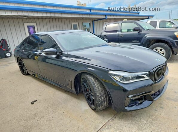 WBA7F0C5XHGM21065 2017 BMW OTHER Черный Передняя правая четверть