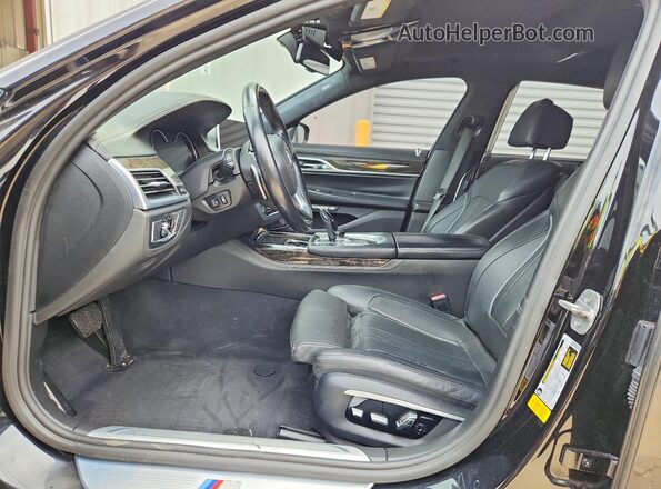 WBA7F0C5XHGM21065 2017 BMW OTHER Черный Вид салона спереди