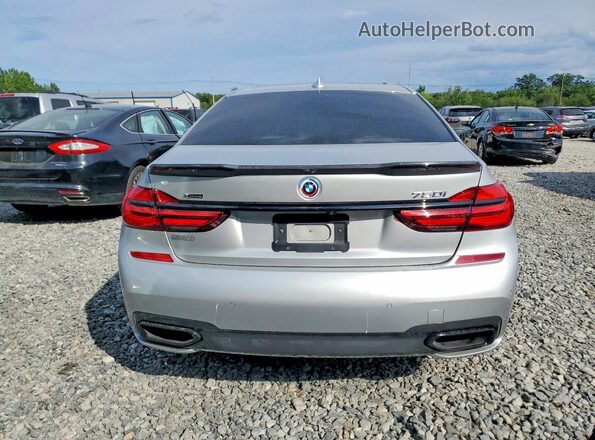 WBA7F2C38HG422807 2017 BMW 7 SERIES Silver უკანა ხედი