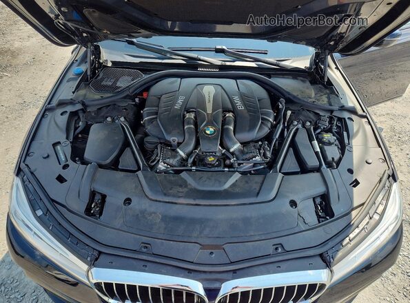 WBA7F2C51HG422553 2017 BMW 7 SERIES Blue Սալոնի հետևի տեսք