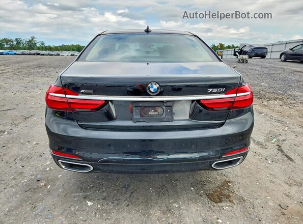 WBA7F2C52GG419109 2016 BMW 7 SERIES Black Вид ззаду