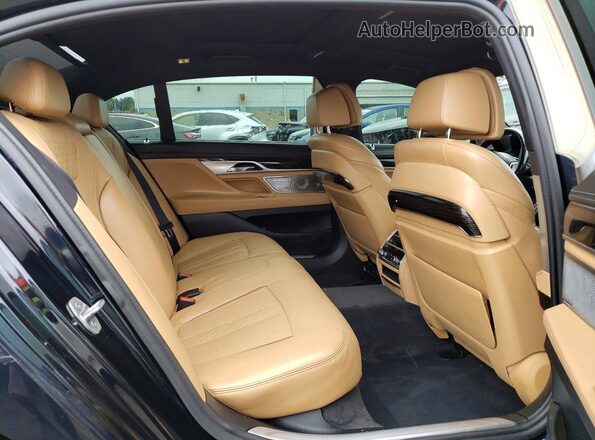 WBA7F2C54GG415837 2016 BMW 7 SERIES Blue Rear seats view