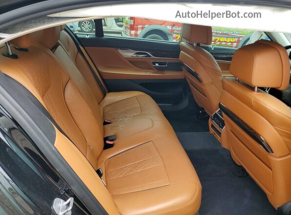 WBA7F2C54JG424075 2018 BMW 7 SERIES Black Vista de los asientos traseros