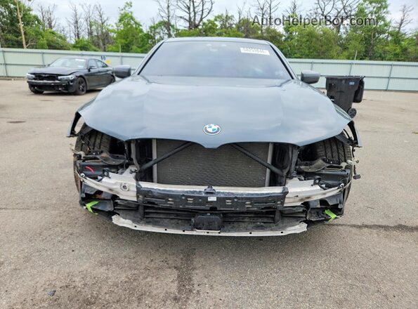 WBA7F2C58JB238911 2018 BMW 7 SERIES Серый Вид спереди