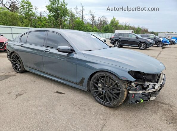 WBA7F2C58JB238911 2018 BMW 7 SERIES Серый Передняя правая четверть