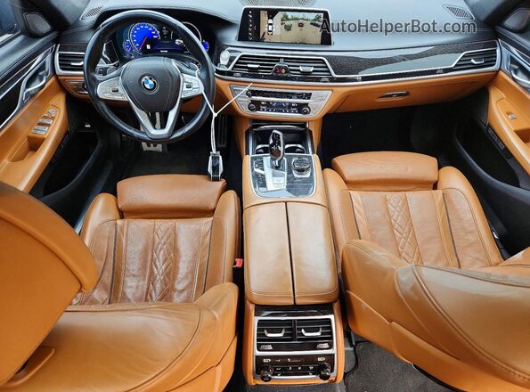 WBA7F2C58JB238911 2018 BMW 7 SERIES Серый Вид панели приборов