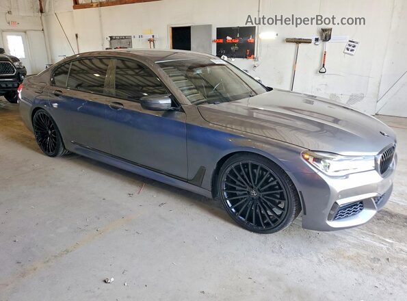 WBA7F2C59GG416790 2016 BMW 7 SERIES Черный Передняя правая четверть