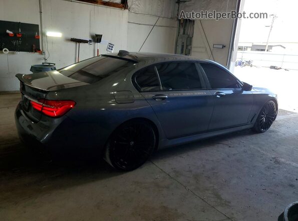 WBA7F2C59GG416790 2016 BMW 7 SERIES Черный Задняя правая четверть