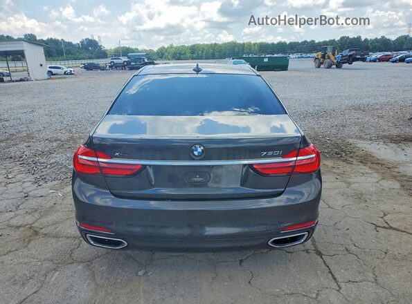 WBA7F2C59GG420175 2016 BMW 7 SERIES Gray Rear view