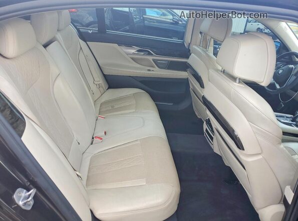 WBA7F2C59GG420175 2016 BMW 7 SERIES Gray Rear seats view