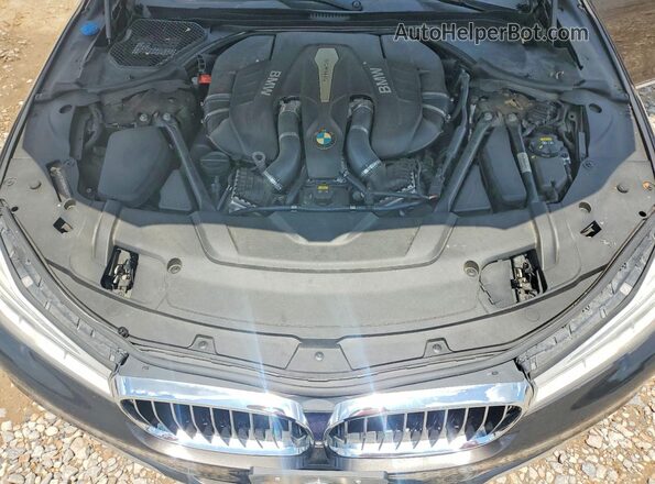 WBA7F2C59GG420175 2016 BMW 7 SERIES Gray Rear interior view