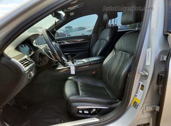WBA7J2C38HG497859 2017 BMW 7 SERIES Silver Вид салону спереду