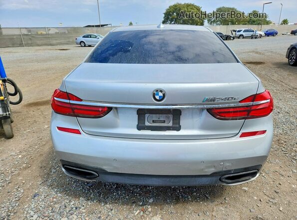 WBA7J2C38HG497859 2017 BMW 7 SERIES Silver Вид ззаду