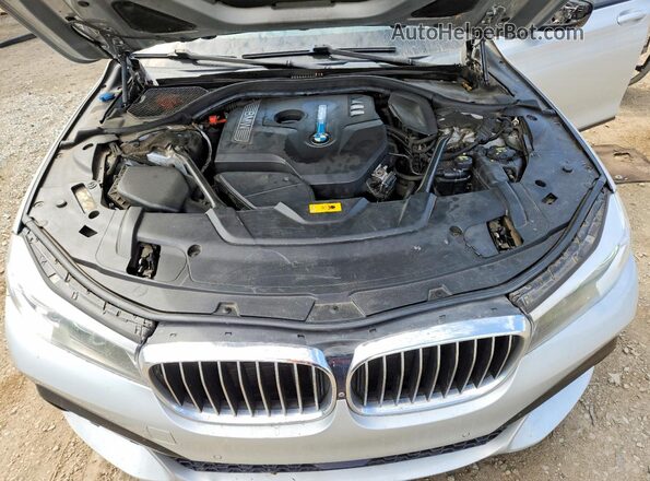 WBA7J2C38HG497859 2017 BMW 7 SERIES Silver Вид задньої частини салону