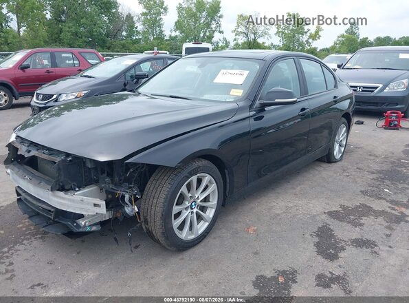 WBA8A3C50GK690661 2016 BMW 3 SERIES Black Vista tres cuartos delantera izquierda