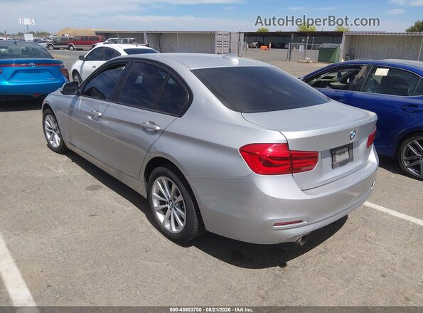 WBA8A3C57HK691291 2017 BMW 3 SERIES Silver Trasero izquierdo