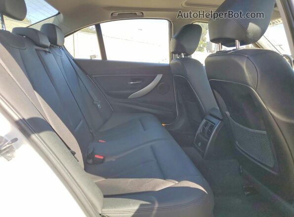 WBA8A3C5XJA487127 2018 BMW 3 SERIES White Vista de los asientos traseros