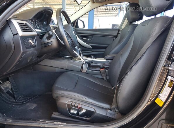 WBA8A9C50JAD26906 2018 BMW 3 SERIES Черный Вид салона спереди