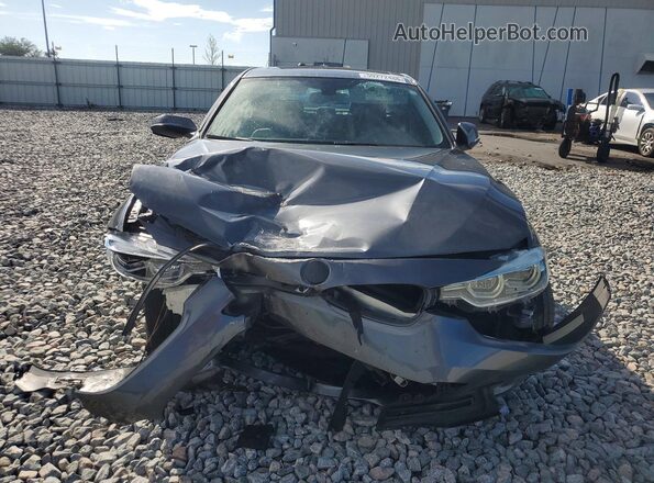 WBA8A9C59JAD28007 2018 BMW 3 SERIES Gray Widok z przodu
