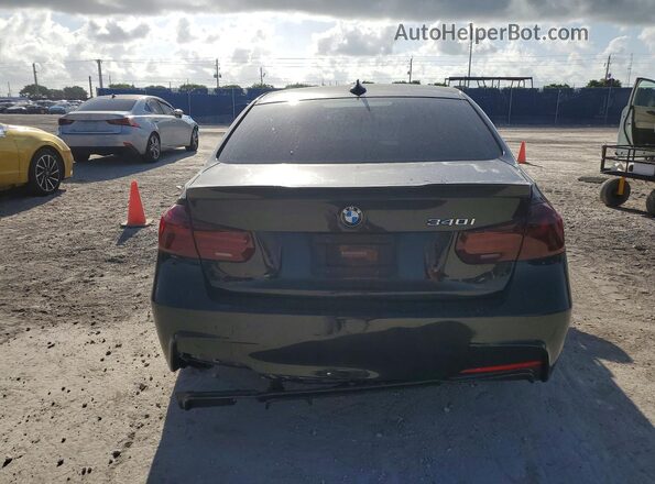 WBA8B3G37HNU36340 2017 BMW 3 SERIES Black Rear view