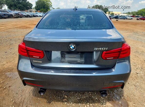 WBA8B3G56HNU35620 2017 BMW 3 SERIES Gray Vista trasera