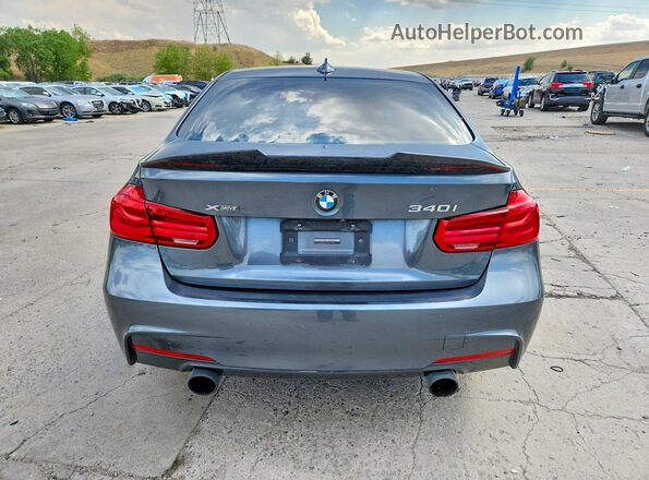 WBA8B7G55JNT71261 2018 BMW 3 SERIES Gray Widok z tyłu