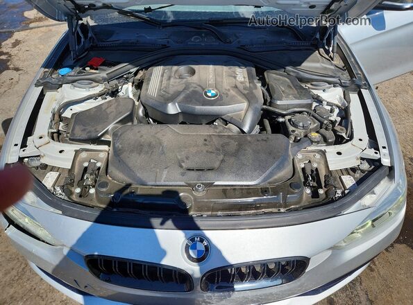 WBA8B9C50JEE83311 2018 BMW 3 SERIES Серебряный Вид задней части салона