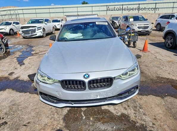 WBA8B9C50JEE83311 2018 BMW 3 SERIES Серебряный Вид спереди