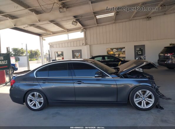 WBA8B9C59JEE81041 2018 BMW 3 SERIES Gray Սալոնի հետևի տեսք