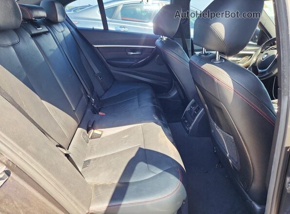 WBA8D9C30HA011715 2017 BMW 3 SERIES Gray Vista de los asientos traseros