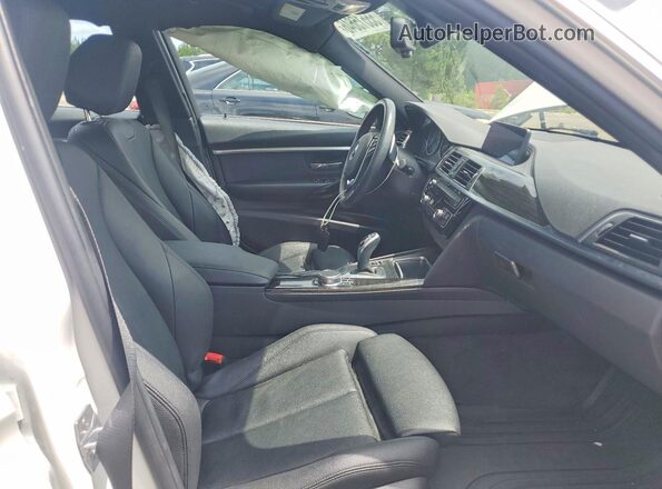 WBA8D9C58JEM31464 2018 BMW 3 SERIES White Front interior view
