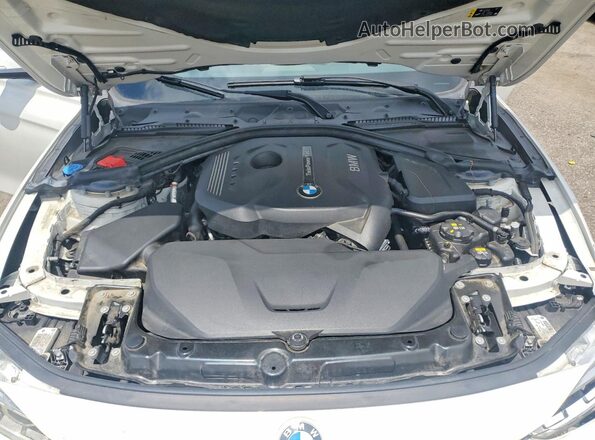 WBA8D9C58JEM31464 2018 BMW 3 SERIES White Rear interior view