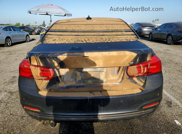 WBA8E1C36HA029733 2017 BMW 3 SERIES Black Rear view