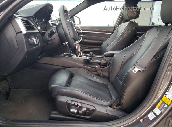 WBA8E1C52JA178602 2018 BMW 3 SERIES Черный Вид салона спереди