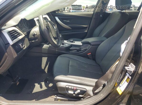 WBA8E1G52JNU90308 2018 BMW 3 SERIES Черный Вид салона спереди