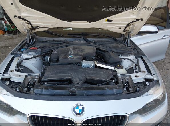 WBA8E1G54HNU14616 2017 BMW 3 SERIES Silver Հետևի տեսք