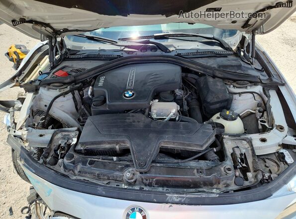 WBA8E1G59GNU12245 2016 BMW 3 SERIES Silver Rear interior view