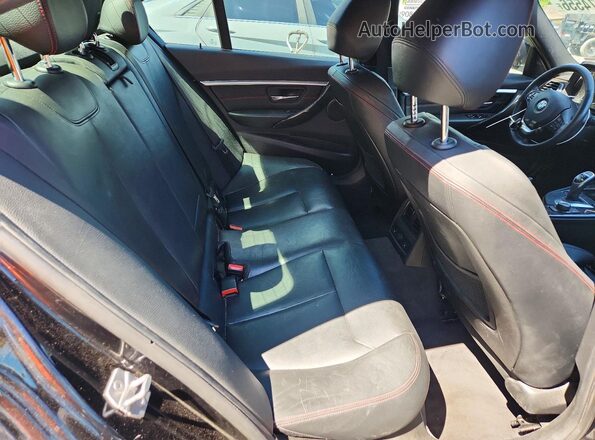 WBA8E3G58GNU04259 2016 BMW 3 SERIES Black Vista de los asientos traseros