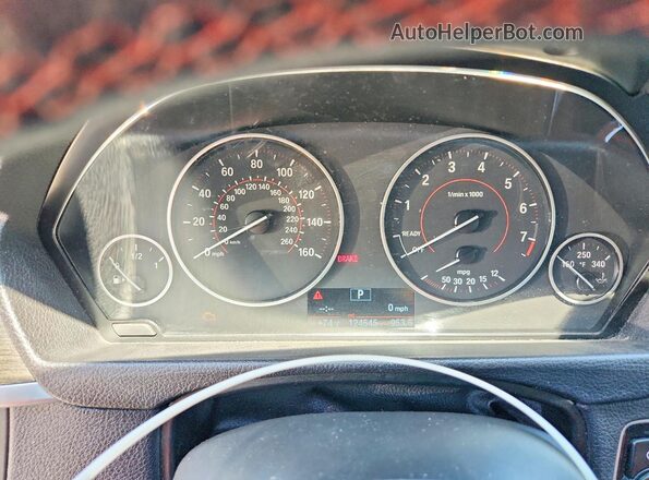WBA8E3G58GNU04259 2016 BMW 3 SERIES Black Vista del cuadro de instrumentos