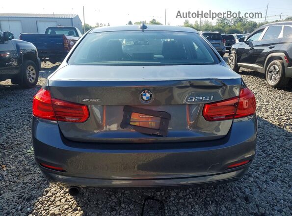 WBA8E5G34HNU43569 2017 BMW 3 SERIES Gray Вид салону спереду