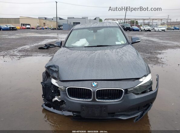 WBA8E5G54GNT41298 2016 BMW 3 SERIES Gray ხელსაწყოთა პანელის ხედი