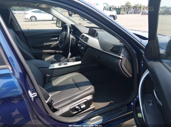 WBA8E5G54HNU42262 2017 BMW 3 SERIES Navy Front interior view